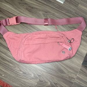 Lululemon Fanny pack/ cross body bag, rose colored with silver hardware